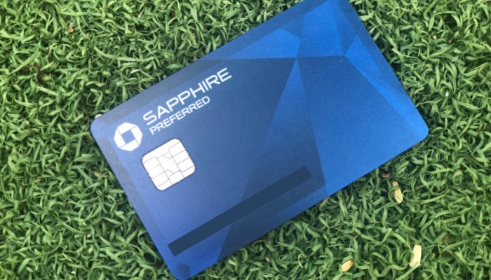 a chase sapphire preferred card with a green background