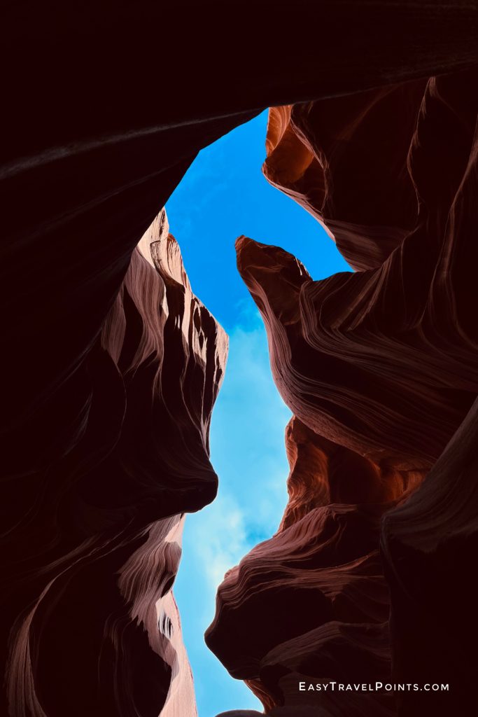 look up from inside antelope canyon with the sky shapes like a seahorse
