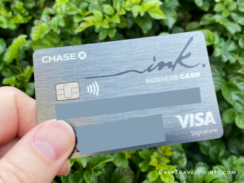 someone holding the Chase Ink Business Cash credit card