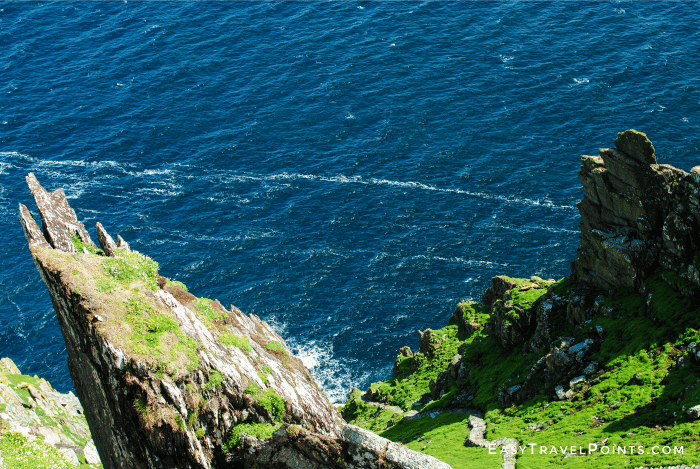 looking down a cliff on skellig michael